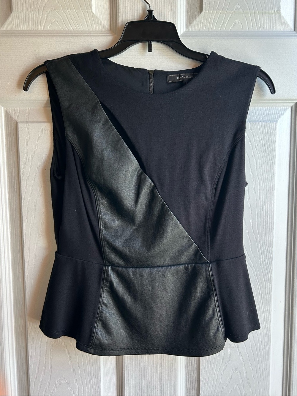 BCBGMaxAzria Black Sleeveless Peplum Top with Faux Leather Diagonal Panel - S